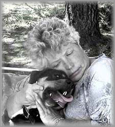 woman hugging grateful dog